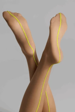 Maison Close Nude Cut & Curled Yellow Seam Stockings 20 Denier 14 Maison Close Nude Cut & Curled Yellow Seam Stockings 20 Denier -Fashion Lingerie Store maison close nude neon yellow cut curled seamed stockings 1